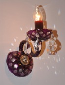 Wall light from dark purple glass